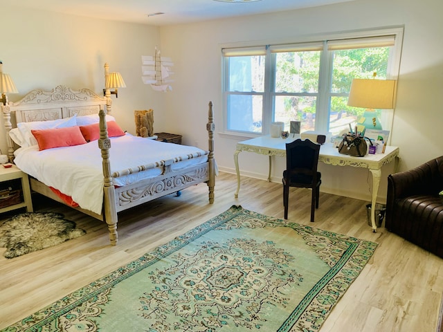 1202 Ventura Pl, Mount Pleasant, SC 29464 - bedroom with wood finished floors and baseboards