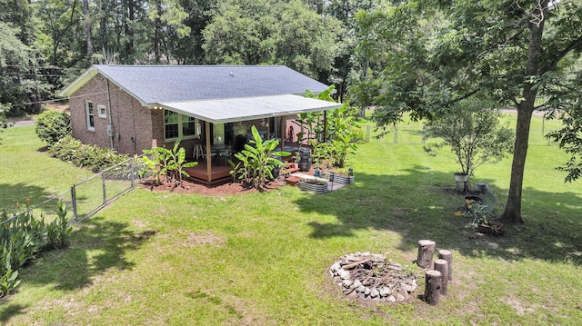 7274 Commodore Rd, Hollywood, SC 29449 - view of yard with an outdoor fire pit and a wooden deck