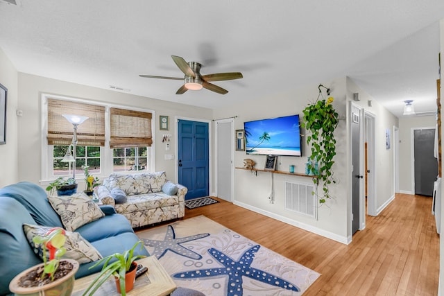 7274 Commodore Rd, Hollywood, SC 29449 - living area with wood finished floors and ceiling fan