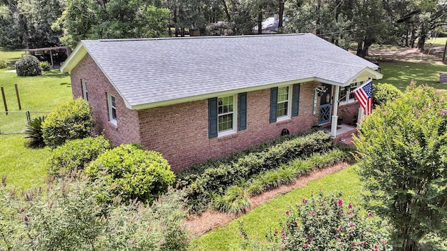 7274 Commodore Rd, Hollywood, SC 29449 - view of front of house with brick siding, roof with shingles, and view of wooded area