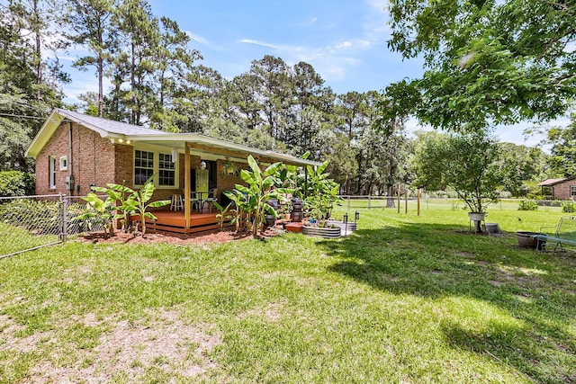 7274 Commodore Rd, Hollywood, SC 29449 - fenced backyard with a deck