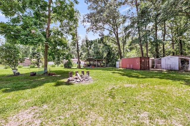 7274 Commodore Rd, Hollywood, SC 29449 - view of grassy yard with a storage shed and view of scattered trees