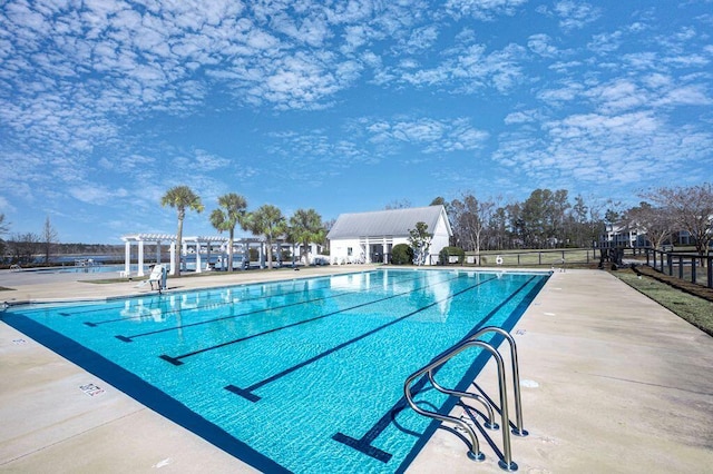 view of pool with a pergola