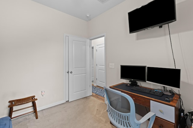 office area with carpet flooring and baseboards