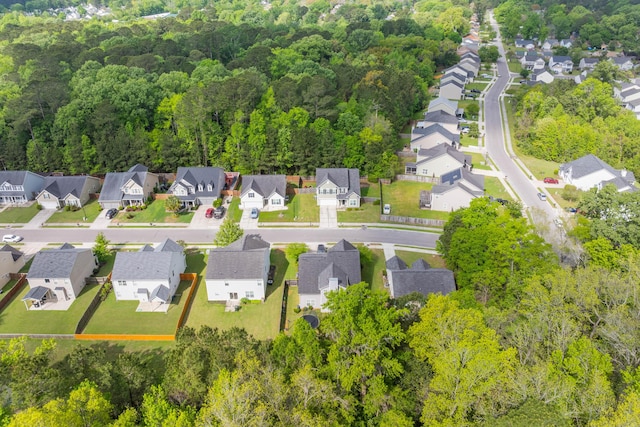 aerial view with a forest view and a residential view