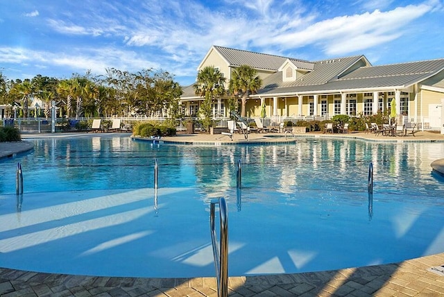 view of swimming pool with a patio