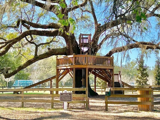 view of play area with a deck