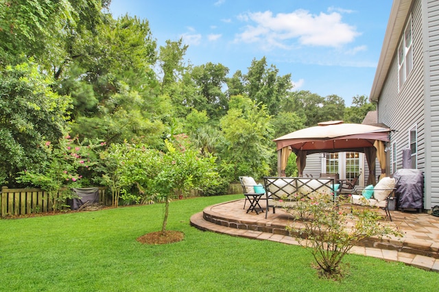 view of yard featuring a gazebo and a patio