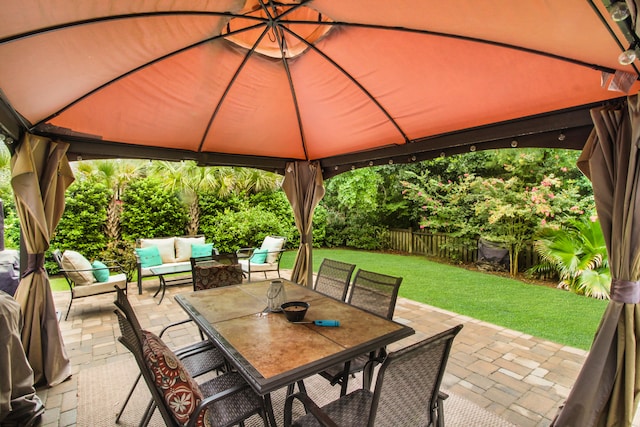 view of patio featuring a gazebo and an outdoor living space