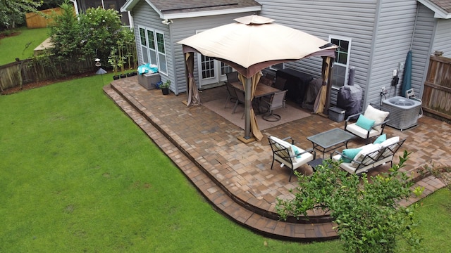 view of patio featuring a gazebo, an outdoor living space, and central AC