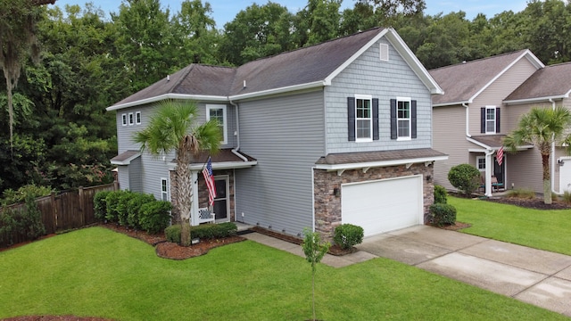 view of front facade featuring a garage and a front lawn