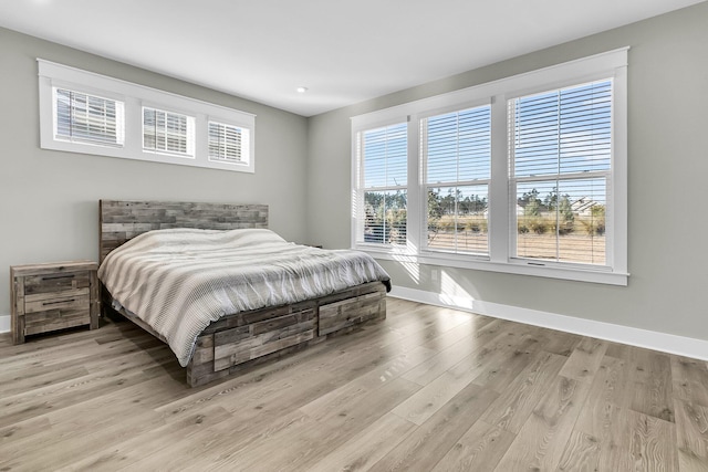 bedroom featuring light wood-type flooring