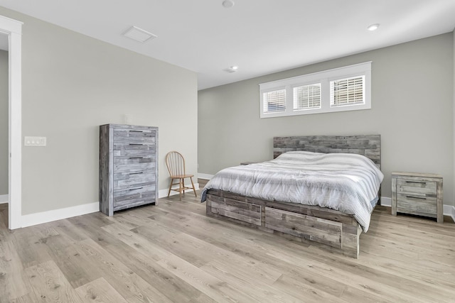 bedroom featuring light wood-type flooring