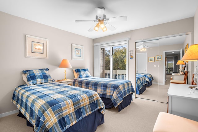 bedroom with light carpet, ceiling fan, and baseboards