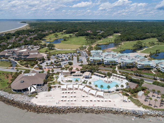 aerial view featuring a water view and view of golf course