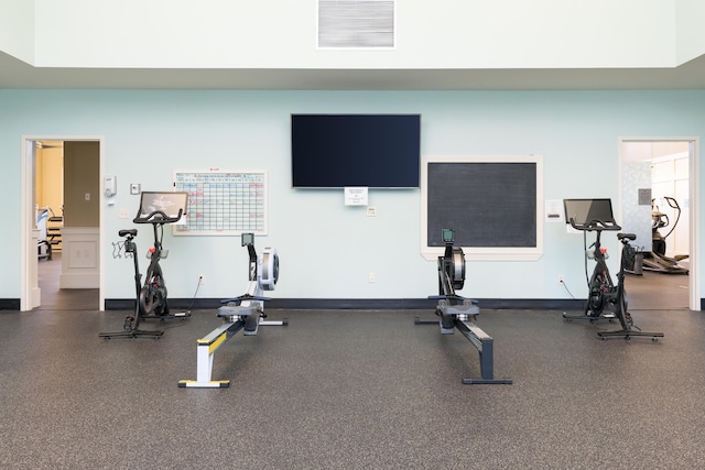 workout area featuring visible vents and baseboards