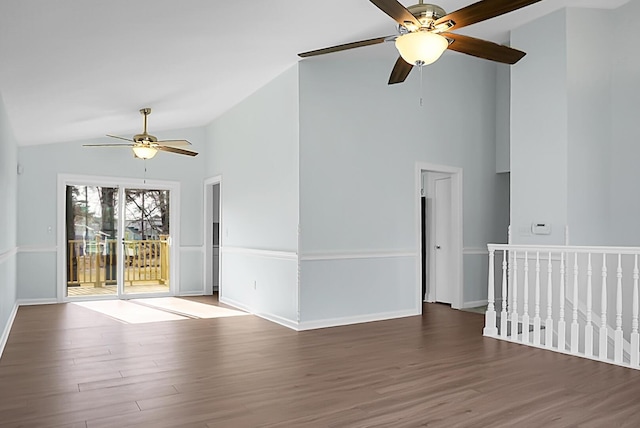 unfurnished room with high vaulted ceiling, a ceiling fan, baseboards, and wood finished floors