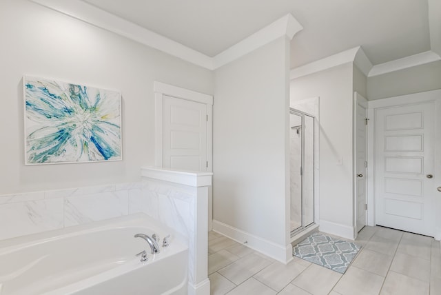 bathroom featuring independent shower and bath and tile flooring