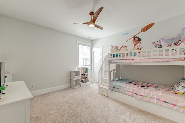 bedroom with light colored carpet and ceiling fan