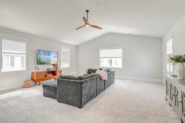 living room with light carpet, ceiling fan, and lofted ceiling