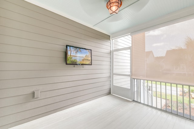 empty room with light hardwood / wood-style flooring