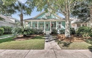 bungalow-style house featuring a front yard