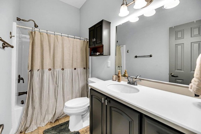 full bathroom with tile patterned floors, vanity, shower / tub combo, and toilet