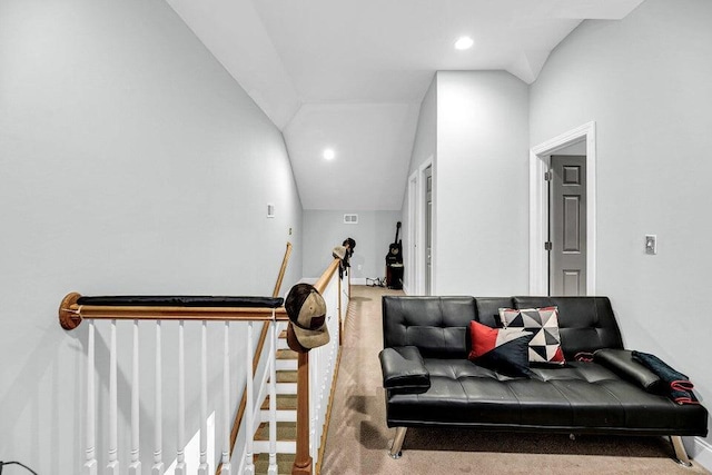 interior space featuring lofted ceiling and light colored carpet