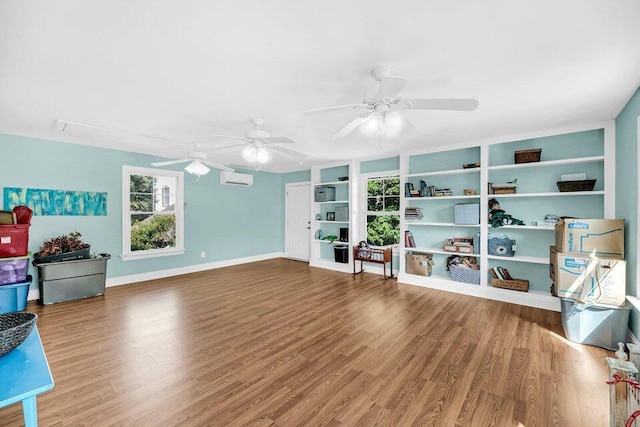 interior space with hardwood / wood-style floors, built in features, and a wall mounted AC