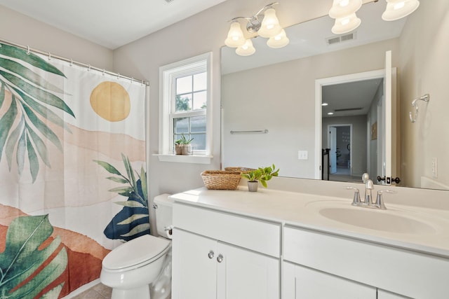 1606 Stovall Ct, Johns Island, SC 29455 - bathroom featuring curtained shower, visible vents, toilet, and vanity