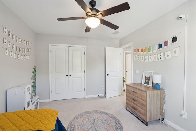 1606 Stovall Ct, Johns Island, SC 29455 - bedroom with a closet, a ceiling fan, baseboards, and light carpet
