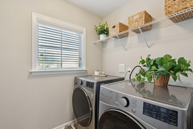 1606 Stovall Ct, Johns Island, SC 29455 - laundry area featuring washing machine and clothes dryer, laundry area, and baseboards