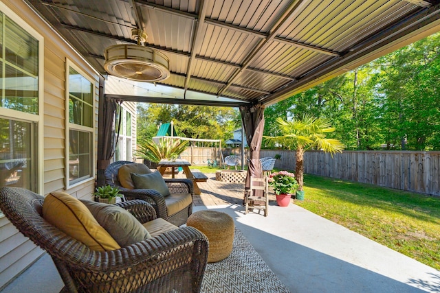1606 Stovall Ct, Johns Island, SC 29455 - view of patio featuring a trampoline and a fenced backyard