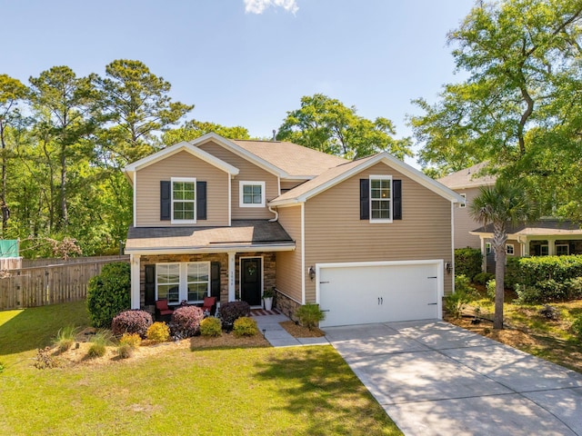 1606 Stovall Ct, Johns Island, SC 29455 - craftsman-style home featuring a front lawn, stone siding, an attached garage, fence, and a porch