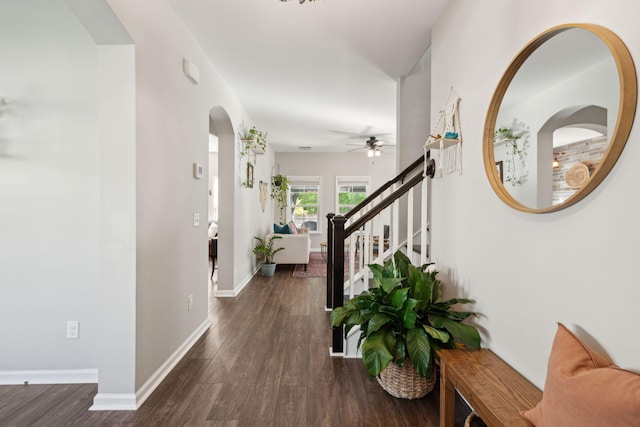 1606 Stovall Ct, Johns Island, SC 29455 - hall featuring stairway, arched walkways, wood finished floors, and baseboards