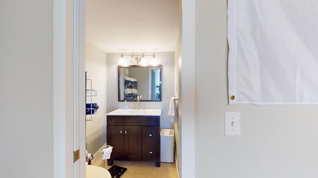 bathroom featuring tile patterned floors and vanity