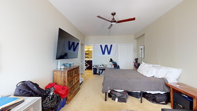 carpeted bedroom featuring ceiling fan