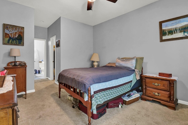 bedroom featuring ceiling fan and light colored carpet