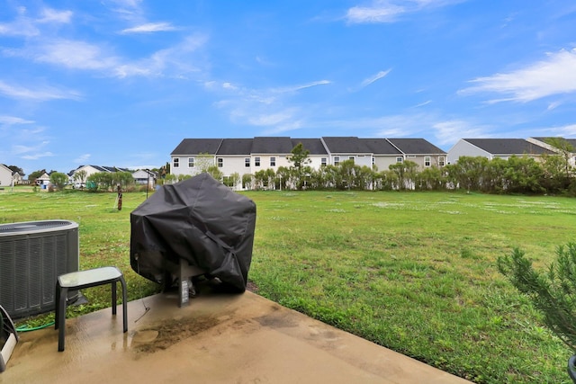 view of yard featuring central AC unit