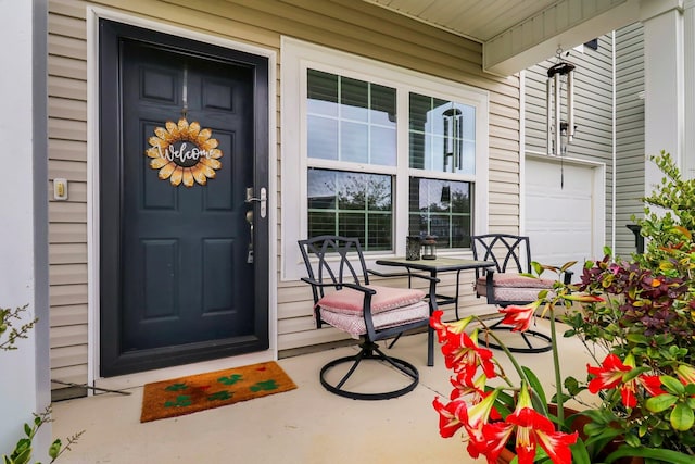 property entrance with covered porch