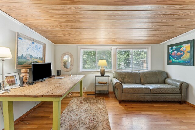 office area featuring ornamental molding, light wood-type flooring, and wooden ceiling