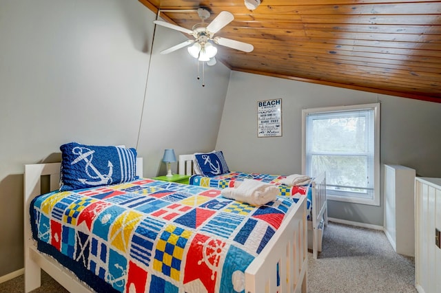 carpeted bedroom with vaulted ceiling, wooden ceiling, and ceiling fan