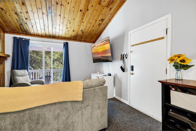 bedroom with lofted ceiling, dark carpet, and wood ceiling