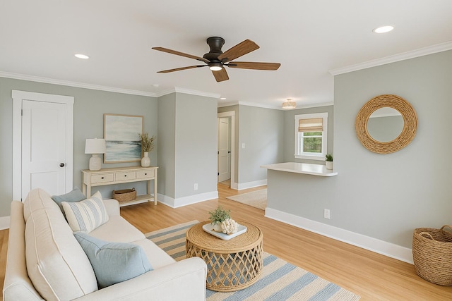 1312 Congress St, Beaufort, SC 29902 - living room with light wood finished floors, ornamental molding, ceiling fan, and recessed lighting