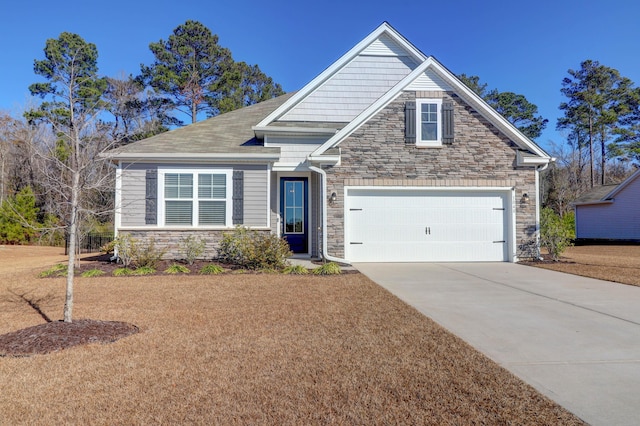 craftsman house featuring a garage