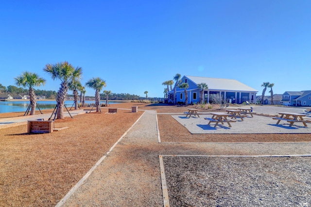 view of property's community featuring a water view