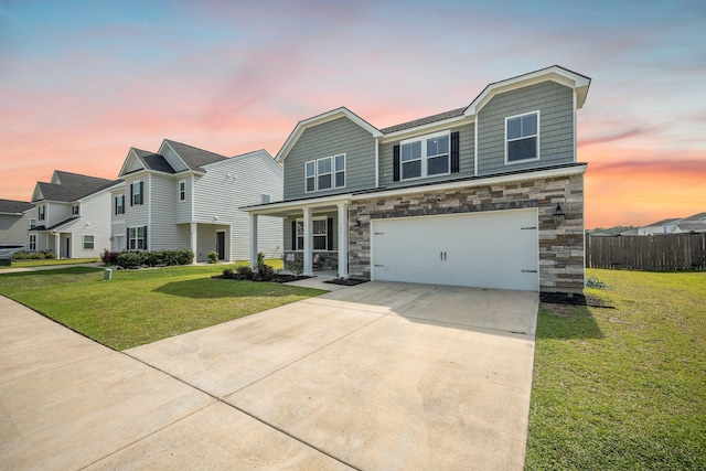 705 Squire Pope Rd, Summerville, SC 29486 - view of front of home featuring covered porch, driveway, stone siding, and a garage