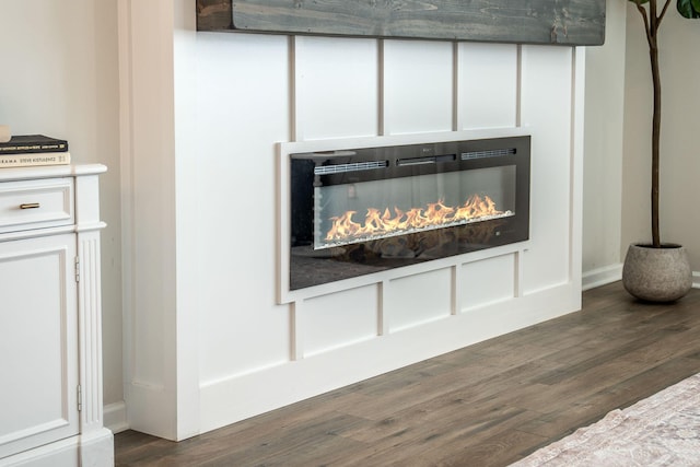 705 Squire Pope Rd, Summerville, SC 29486 - detailed view of wood finished floors and a glass covered fireplace