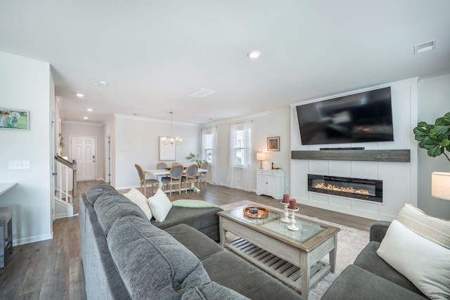 705 Squire Pope Rd, Summerville, SC 29486 - living area featuring wood finished floors, a chandelier, crown molding, recessed lighting, and baseboards