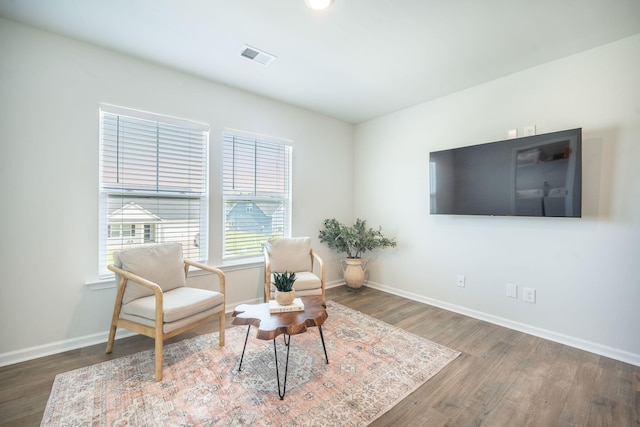 705 Squire Pope Rd, Summerville, SC 29486 - living area with baseboards and wood finished floors